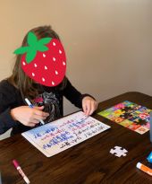 student practicing reading and writing